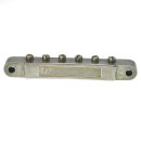 ABRM-BA        ABRM Bridge, Fits 4mm studs, Aged Nickel, Brass saddles natural